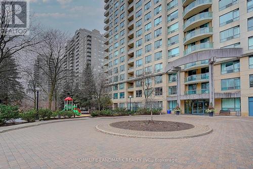 303 - 238 Doris Avenue, Toronto, ON - Outdoor With Balcony With Facade