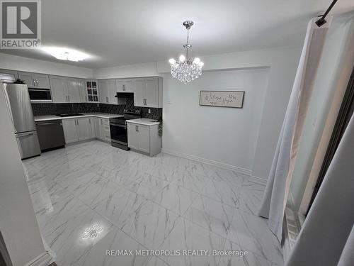 107 - 1701 Mccowan Road, Toronto, ON - Indoor Photo Showing Kitchen With Double Sink