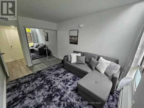 107 - 1701 Mccowan Road, Toronto, ON - Indoor Photo Showing Living Room