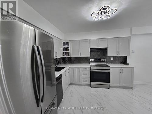 107 - 1701 Mccowan Road, Toronto, ON - Indoor Photo Showing Kitchen With Stainless Steel Kitchen