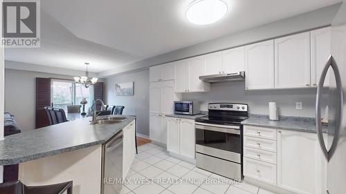 11 Mccreary Trail, Caledon, ON - Indoor Photo Showing Kitchen With Double Sink