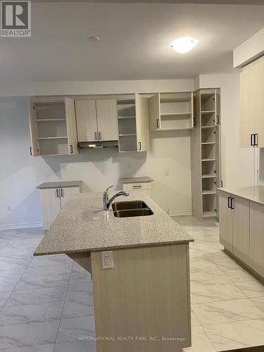 76 Mcbride Trail, Barrie, ON - Indoor Photo Showing Kitchen With Double Sink