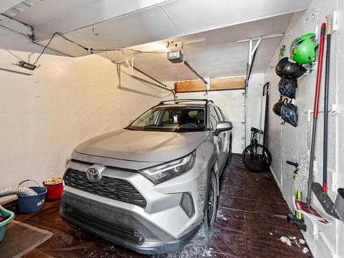 Garage - 25 Rue De Tanglewood, Kirkland, QC - Indoor Photo Showing Garage