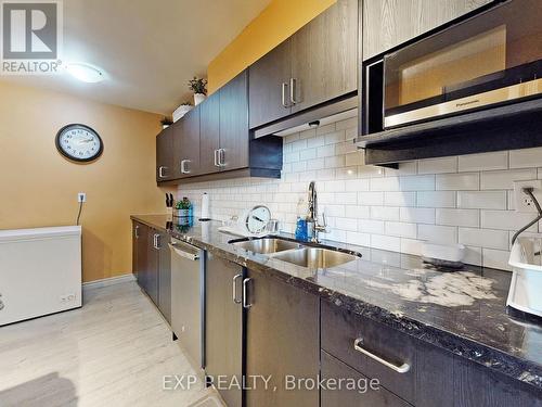 819 - 180 Markham Road, Toronto, ON - Indoor Photo Showing Kitchen With Double Sink With Upgraded Kitchen