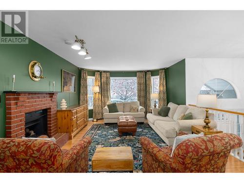 487 Glen Pine Court, Kelowna, BC - Indoor Photo Showing Living Room With Fireplace