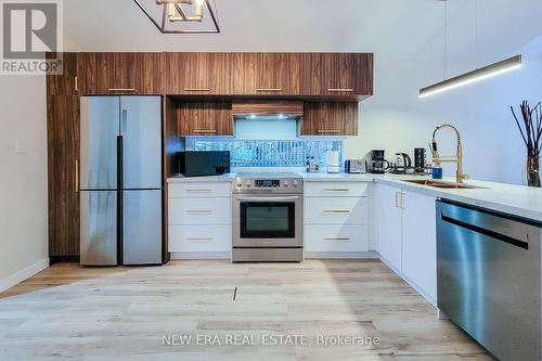 5759 Robinson Street, Niagara Falls, ON - Indoor Photo Showing Kitchen With Stainless Steel Kitchen With Double Sink