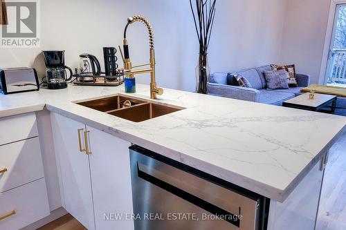 5759 Robinson Street, Niagara Falls, ON - Indoor Photo Showing Kitchen With Double Sink