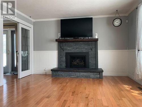 9437 6 Street, Dawson Creek, BC - Indoor Photo Showing Living Room With Fireplace