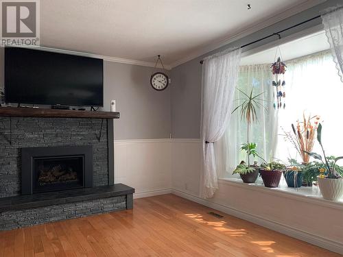 9437 6 Street, Dawson Creek, BC - Indoor Photo Showing Living Room With Fireplace