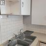 119 4Th Avenue W, Canora, SK  - Indoor Photo Showing Kitchen With Double Sink 