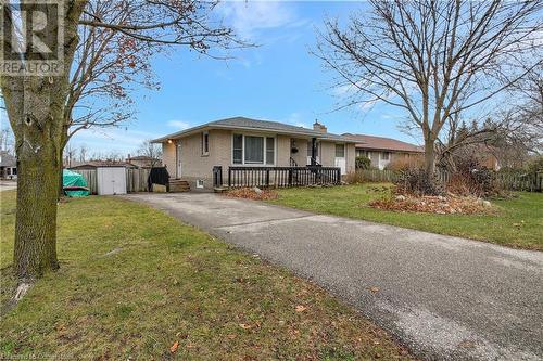 Ranch-style home featuring a shed and a front lawn - 362 Blair Road, Cambridge, ON - Outdoor With Deck Patio Veranda