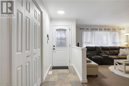 Entryway featuring ornamental molding and carpet floors - 362 Blair Road, Cambridge, ON - Indoor Photo Showing Other Room