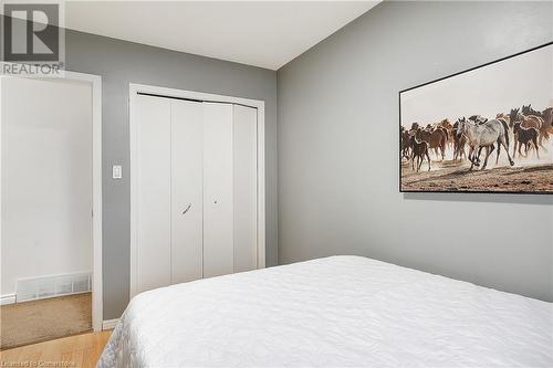 Bedroom with light hardwood / wood-style floors and a closet - 362 Blair Road, Cambridge, ON - Indoor Photo Showing Bedroom