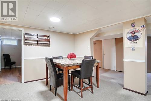 Dining room with light carpet and crown molding - 362 Blair Road, Cambridge, ON - Indoor