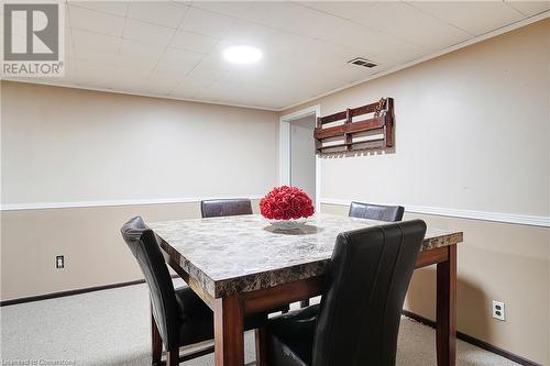 Dining room featuring carpet flooring and crown molding - 362 Blair Road, Cambridge, ON - Indoor Photo Showing Dining Room