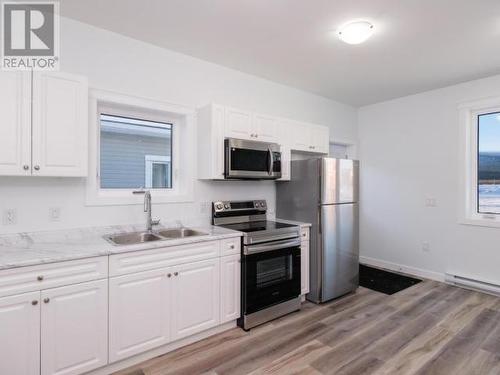 149 Rampart Avenue, Whitehorse, YT - Indoor Photo Showing Kitchen With Double Sink