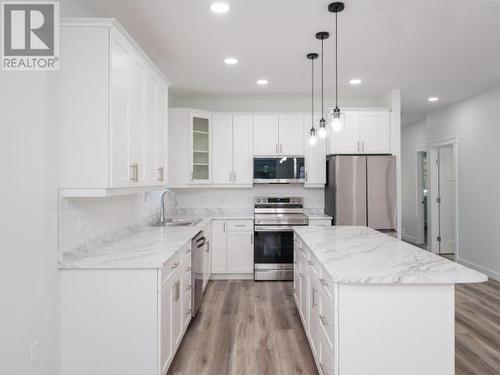 149 Rampart Avenue, Whitehorse, YT - Indoor Photo Showing Kitchen With Upgraded Kitchen