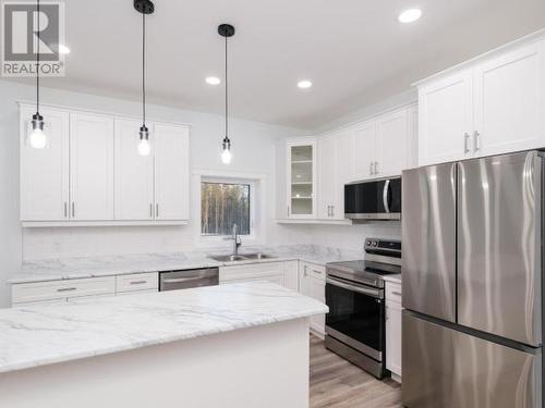 149 Rampart Avenue, Whitehorse, YT - Indoor Photo Showing Kitchen With Double Sink With Upgraded Kitchen