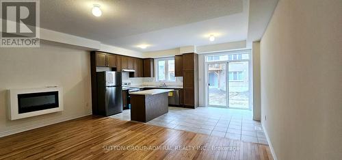 1004 Crowsnest Hollow, Pickering, ON - Indoor Photo Showing Kitchen With Fireplace