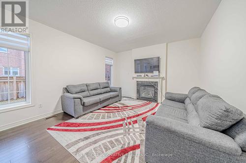 492 Forsyth Farm Drive, Whitchurch-Stouffville, ON - Indoor Photo Showing Living Room With Fireplace