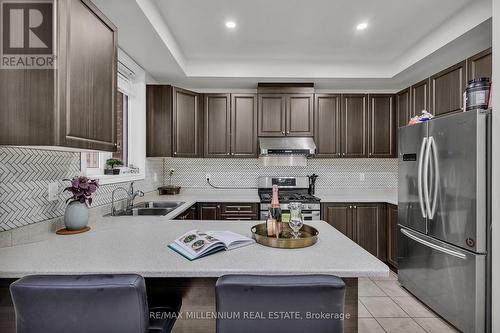 65 New Pines Trail, Brampton, ON - Indoor Photo Showing Kitchen With Stainless Steel Kitchen With Double Sink With Upgraded Kitchen