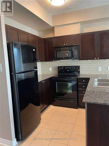 906 - 3525 Kariya Drive, Mississauga, ON - Indoor Photo Showing Kitchen With Double Sink