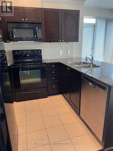 906 - 3525 Kariya Drive, Mississauga, ON - Indoor Photo Showing Kitchen With Double Sink