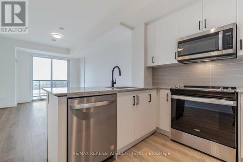 608 - 345 Wheat Boom Drive, Oakville, ON - Indoor Photo Showing Kitchen With Upgraded Kitchen