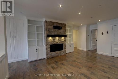 139 Driftwood Village, Kawartha Lakes (Coboconk), ON - Indoor Photo Showing Other Room With Fireplace