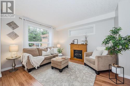 52 Carrington Place, Guelph (Kortright West), ON - Indoor Photo Showing Living Room With Fireplace