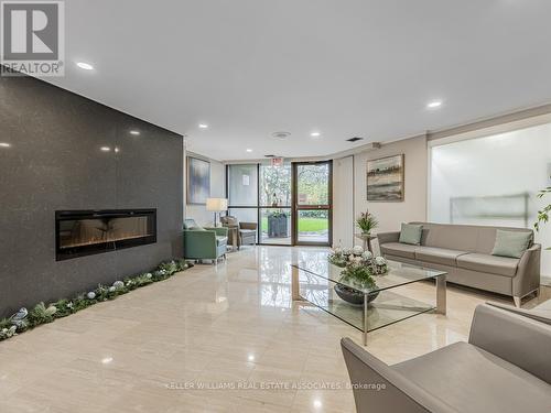 804 - 95 La Rose Avenue, Toronto, ON - Indoor Photo Showing Living Room With Fireplace