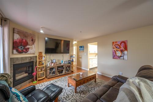 105-2401 South Main Street, Penticton, BC - Indoor Photo Showing Living Room With Fireplace