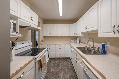 105-2401 South Main Street, Penticton, BC - Indoor Photo Showing Kitchen With Double Sink