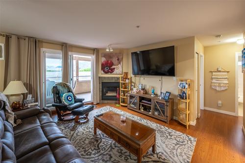 105-2401 South Main Street, Penticton, BC - Indoor Photo Showing Living Room With Fireplace