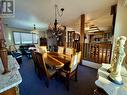 2017 89 Avenue, Dawson Creek, BC  - Indoor Photo Showing Dining Room With Fireplace 