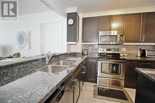 202 - 101 Subway Crescent, Toronto (Islington-City Centre West), ON - Indoor Photo Showing Kitchen With Double Sink With Upgraded Kitchen