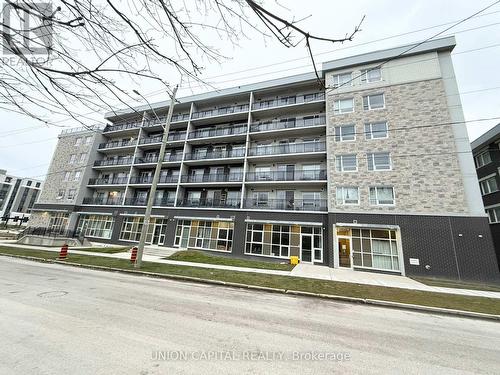 F101 - 275F Larch Street, Waterloo, ON - Outdoor With Facade