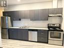 F101 - 275F Larch Street, Waterloo, ON  - Indoor Photo Showing Kitchen With Double Sink With Upgraded Kitchen 