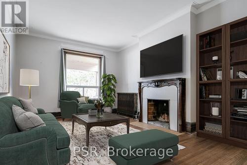 200 - 678 Huron Street, Toronto, ON - Indoor Photo Showing Living Room With Fireplace