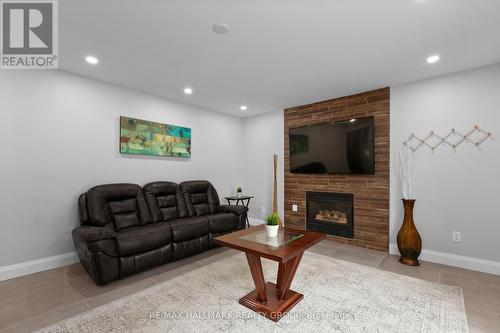 1609 Bottriell Way, Ottawa, ON - Indoor Photo Showing Living Room With Fireplace