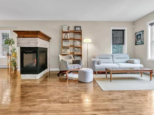 Living room - 1185 Rue Des Cavalières, Bromont, QC - Indoor Photo Showing Living Room With Fireplace