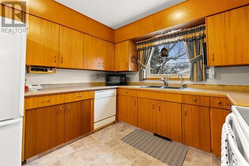 109 Milne Street N, Regina, SK - Indoor Photo Showing Kitchen With Double Sink