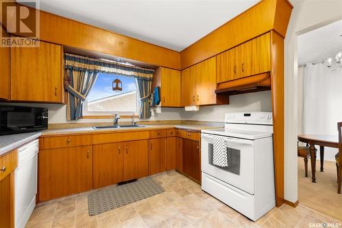 109 Milne Street N, Regina, SK - Indoor Photo Showing Kitchen With Double Sink