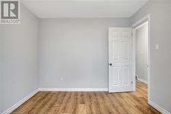 Spare room with light hardwood / wood-style flooring - 