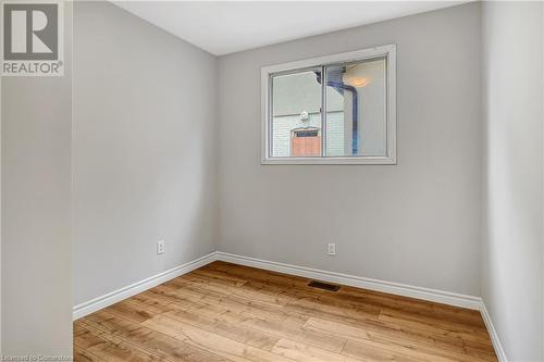 Unfurnished room with light hardwood / wood-style flooring - 24 Crombie Street, Cambridge, ON - Indoor Photo Showing Other Room