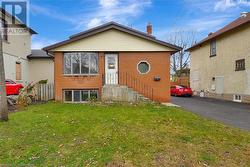 View of front of home featuring a front yard - 