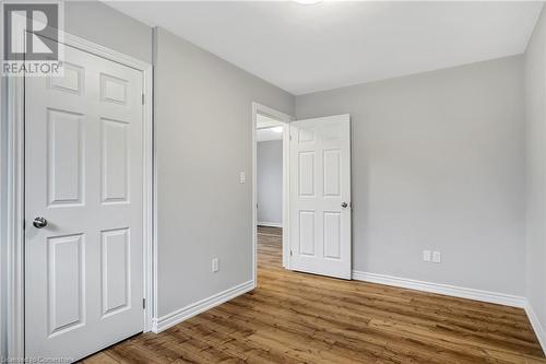 Unfurnished bedroom featuring light hardwood / wood-style floors - 24 Crombie Street, Cambridge, ON - Indoor Photo Showing Other Room