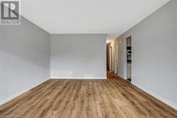 Spare room featuring light wood-type flooring - 