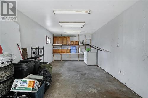 Garage featuring washer / clothes dryer - 24 Crombie Street, Cambridge, ON - Indoor Photo Showing Garage