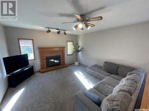 3023 Reves Road, Regina, SK - Indoor Photo Showing Living Room With Fireplace